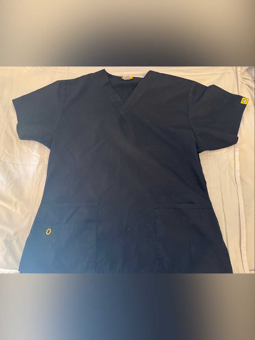 Wink Women’s Medium scrub top, with dual front pockets Yellow Accent